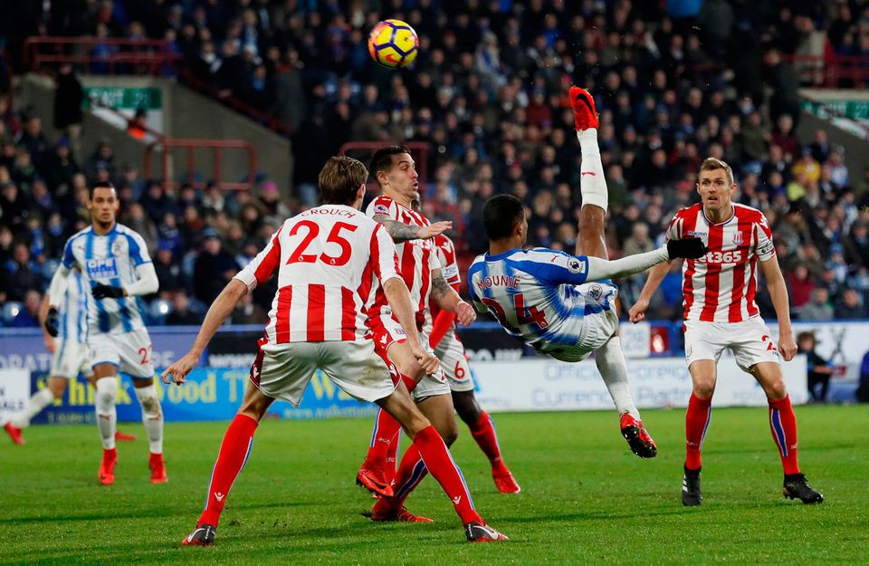 Huddersfield Town’s Steve Mounie attempts an overhead kick. Photo: REUTERS/David Klein