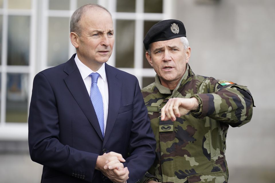 Defence Minister Micheál Martin and Irish Defence Forces chief of staff Lieutenant General Seán Clancy. Photo: Niall Carson/PA