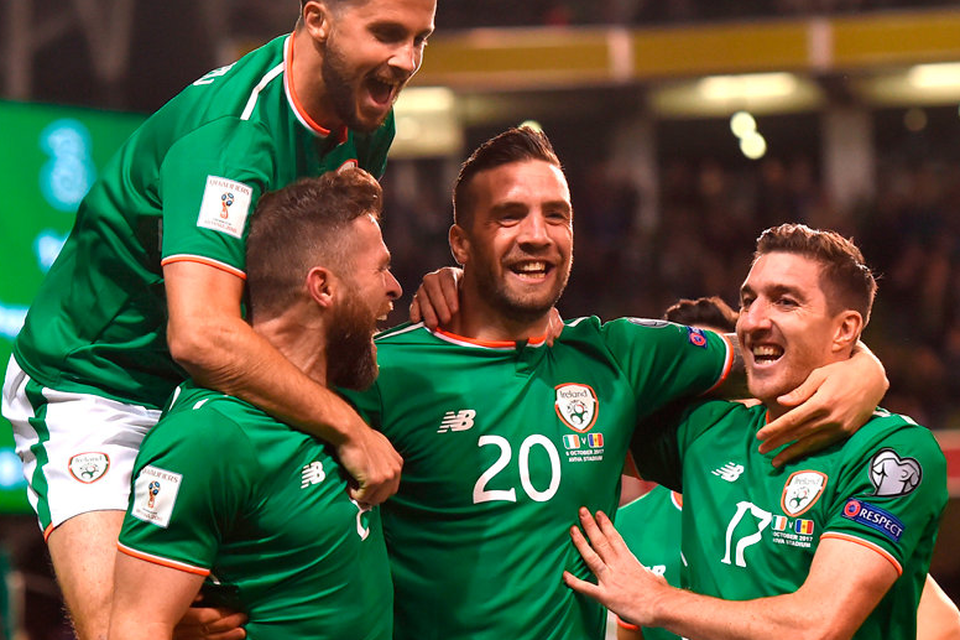 Daryl Murphy celebrates with team-mates Shane Long, Shane Duffy and Stephen Ward after scoring his first goal against Moldova on Friday night. Photo: Sportsfile