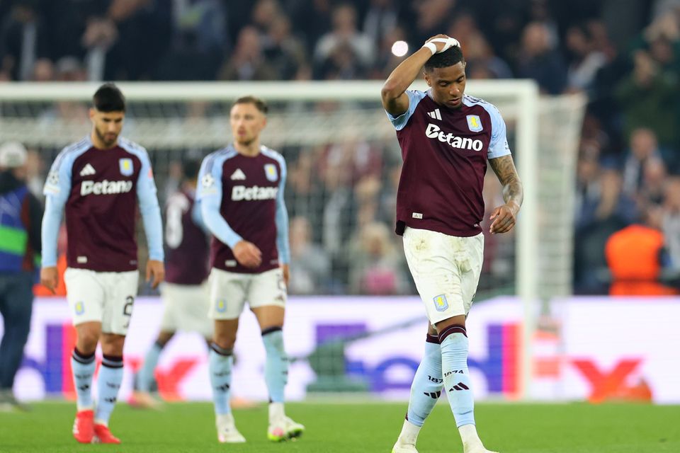 Villa players (l-r) Marco Asensio, Matty Cash and Ezri Konsa walking off the pitch after their Champions League elimination at the hands of PSG. Photo: Getty