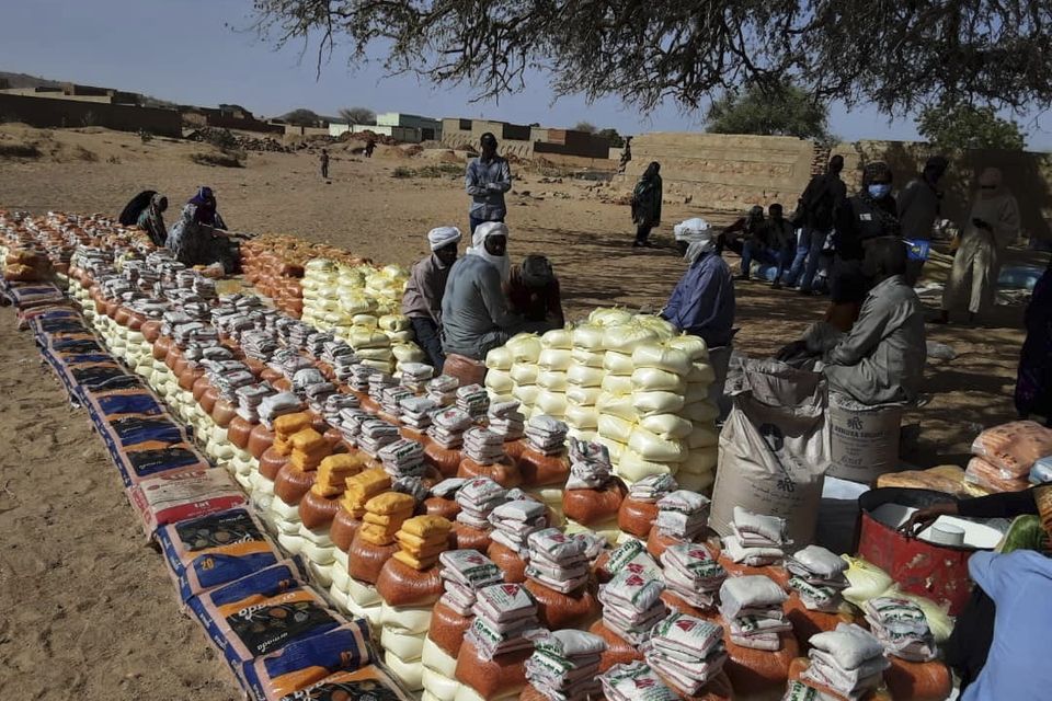 The United Nations distributing food in Sudan’s war-ravaged Darfur province last month, for the first time in months. Photo: World Relief via AP