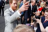 thumbnail: Britain's Princes Harry and William greet wellwishers outside Windsor Castle ahead of Harry's wedding to Meghan Markle tomorrow, in Windsor, Britain, May 18, 2018. REUTERS/Damir Sagolj