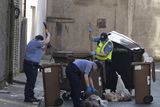 thumbnail: Gardaí searching through bins on Frederick Lane North. Pic: Sam Boal/Collins Photos