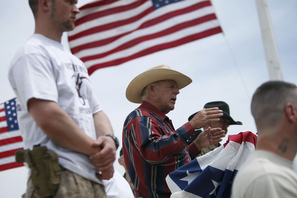 Cliven Bundy, centre, speaking at a protest camp in Nevada (Las Vegas Review-Journal/AP)