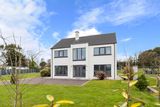 thumbnail: Seafield is a 2019 development of 22 detached houses located a short walk from the sandy beach of Ardnahinch Bay