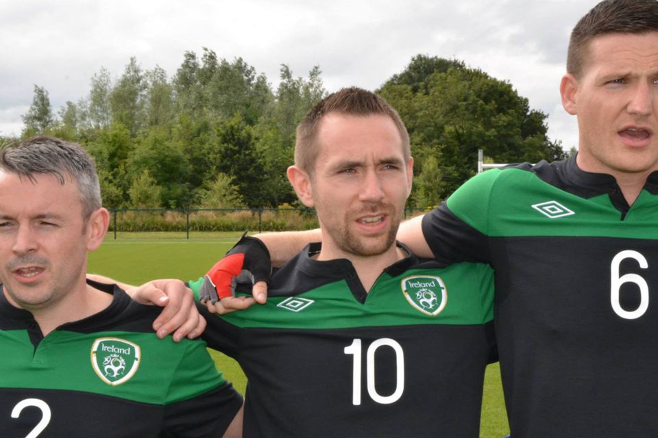 Garry Hoey wearing the number 2 jersey with his international team mates