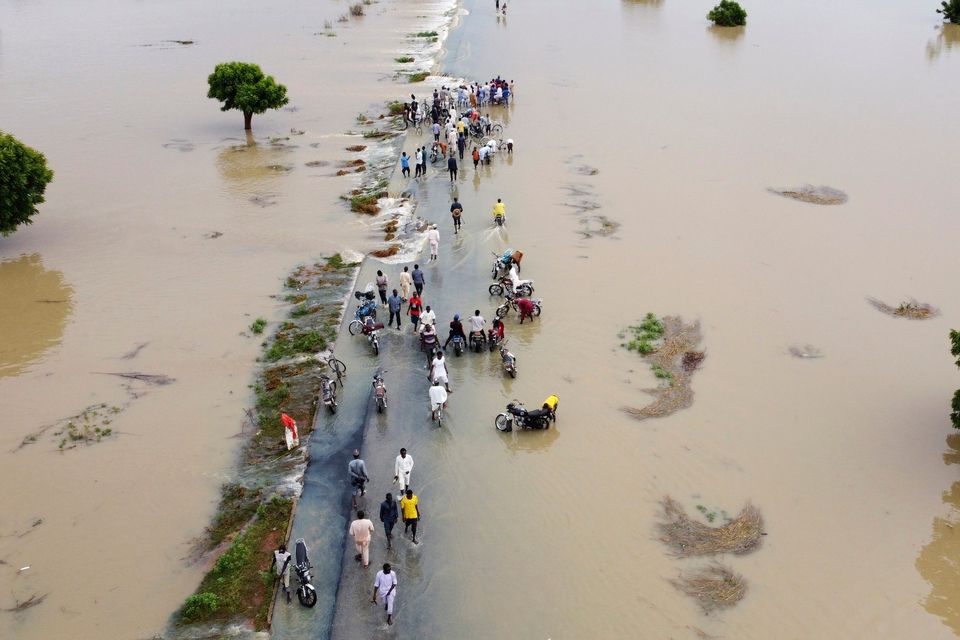 Governments gave their blessing on Sunday to a major new UN report on climate change, after approval was held up by a battle between rich and developing countries over emissions targets and financial aid to vulnerable nations (AP)