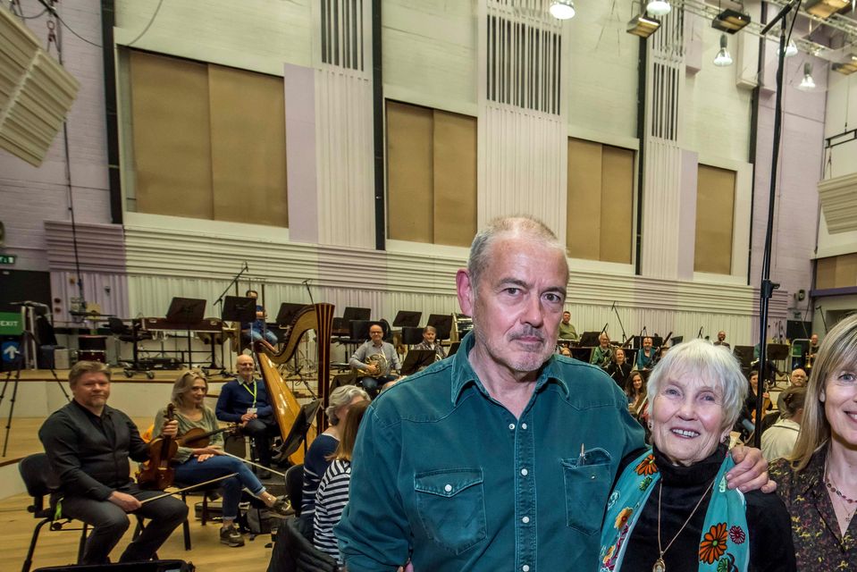 Peggy Seeger with her son Neill MacColl, daughter-in-law Kate St John and the BBC Philharmonic Orchestra (BBC/Chris Payne/PA)