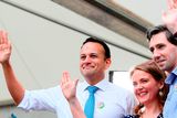 thumbnail: An Taoiseach Leo Varadkar (left), Minister for Health Simon Harris and Senator Catherine Noone wave to the crowd at Dublin Castle. Photo: Brian Lawless/PA Wire