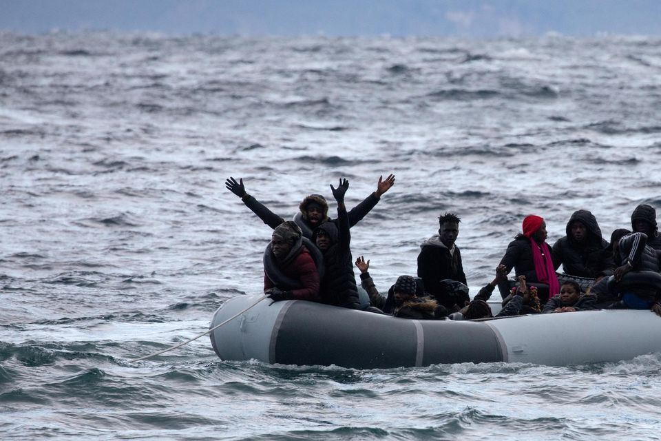 File photo of migrants calling to be rescued from a dinghy in the Mediterranean. Photo: REUTERS/Alkis Konstantinidis.
