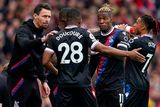thumbnail: Crystal Palace interim manager Paddy McCarthy speaks to Cheick Doucoure and Wilfried Zaha on the touchline during their loss at Arsenal. Photo: PA