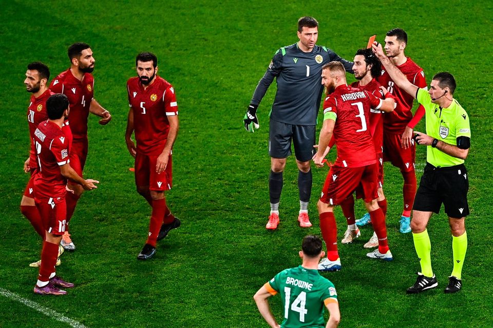Artak Dashyan is shown a red card by referee Rade Obrenovic after a late penalty was awarded against Armenia at the Aviva last night. Photo: Sportsfile