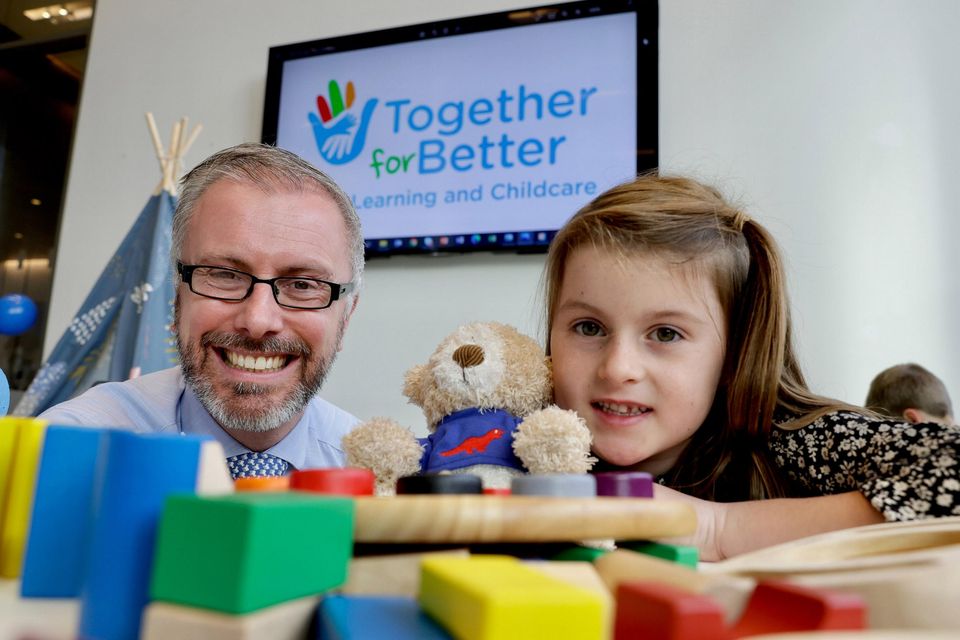 Children's Minister Roderic O’Gorman launching the ‘Together for Better’ new funding model for Early Learning and Care and School Age Childcare with four-year-old Cara Molloy, from Leitrim, yesterday. Photo: Maxwells