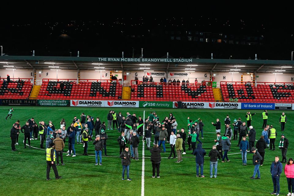 Shamrock Rovers supporters are moved to the centre circle for safety reason after the SSE Airtricity Premier Division match against Derry City at the Ryan McBride Brandywell Stadium in Derry. Photo: Stephen McCarthy/Sportsfile