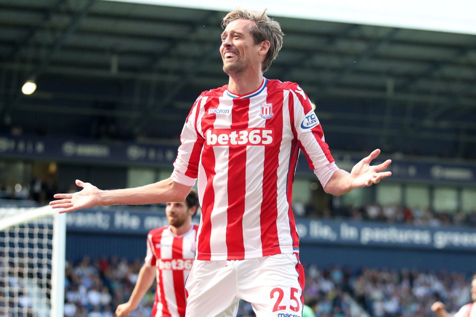 Peter Crouch celebrates Stoke's equaliser at the Hawthorns