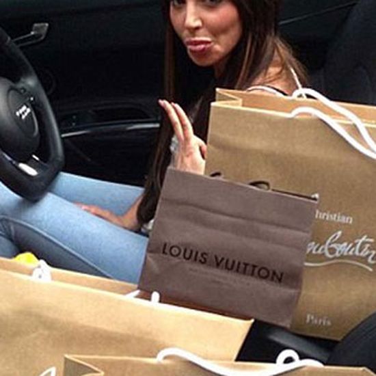 Tulisa celebrates her new look with a shoe shopping spree