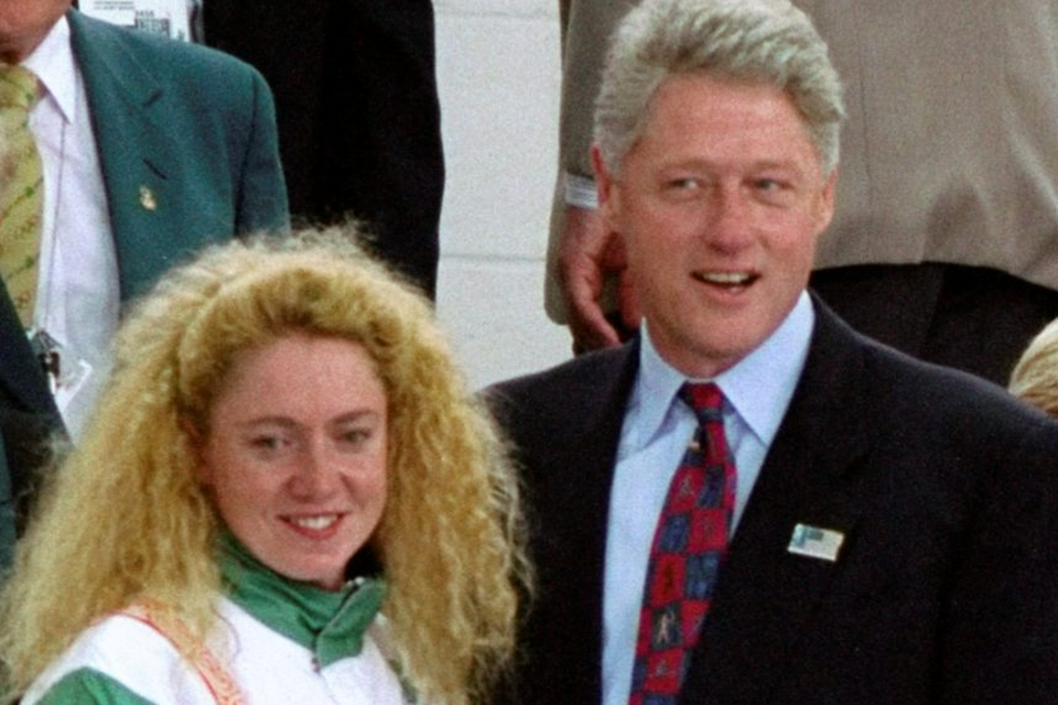 President Bill Clinton meets Michelle Smith after she won the third of her three gold medals at the 1996 Olympics. Photo: Getty