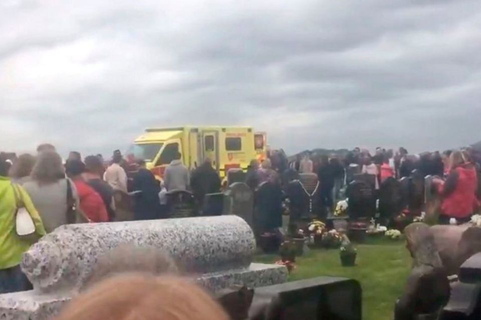 The scene in St Patrick's cemetery, Dowdallshill in Dundalk, where several people have been injured after a car was driven into a crowd. Photo: PA