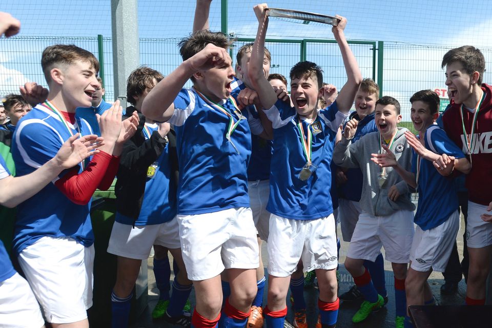 19/05/15. Captain Ryan Eustace of Templeouge College celebrating winning  the Under 15s soccer final between Colaiste Phadraig CBS and Templeouge College at Peamount Utd.
Pic: Justin Farrelly.