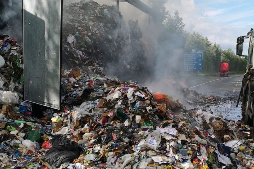 Firefighters battling a blaze on the M1 this evening. Photo: Dublin Fire Brigade.