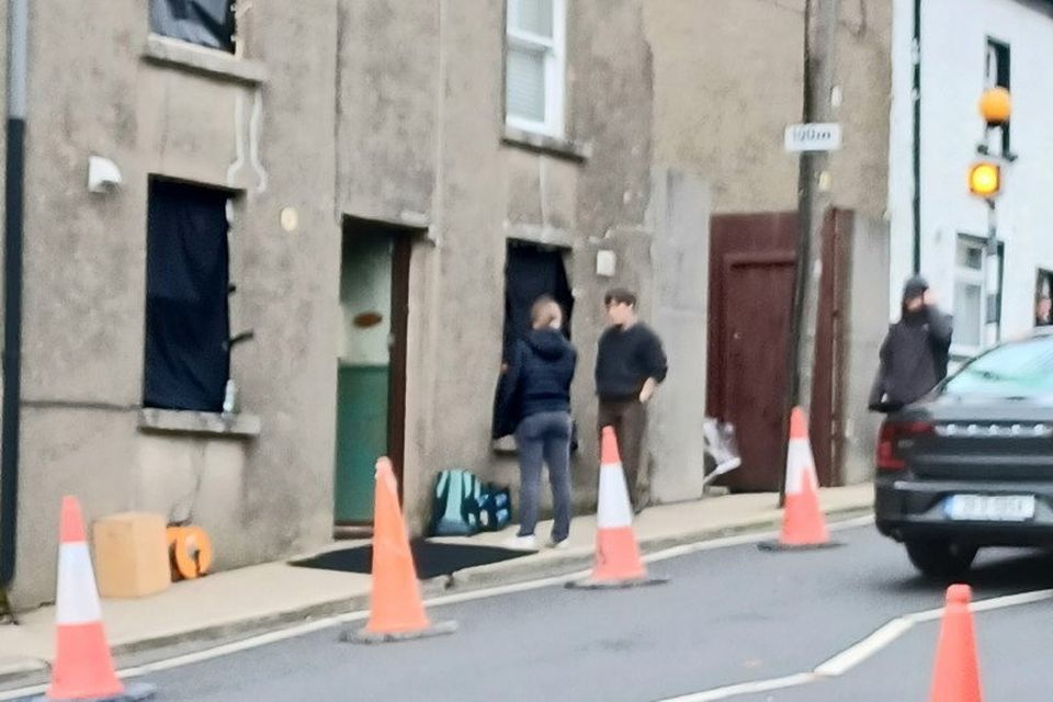 Cillian Murphy outside his character Bill Furlong's house on Michael Street, New Ross.