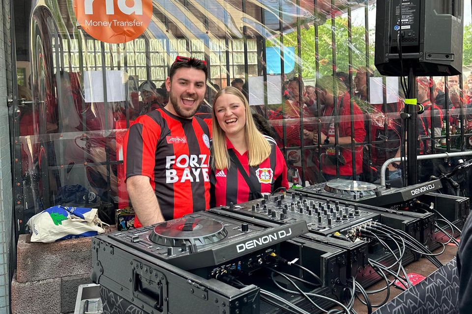 Bayer Leverkusen club DJ Max Saenger with a fan ahead of tomorrow night's Europa League final which takes place in Dublin