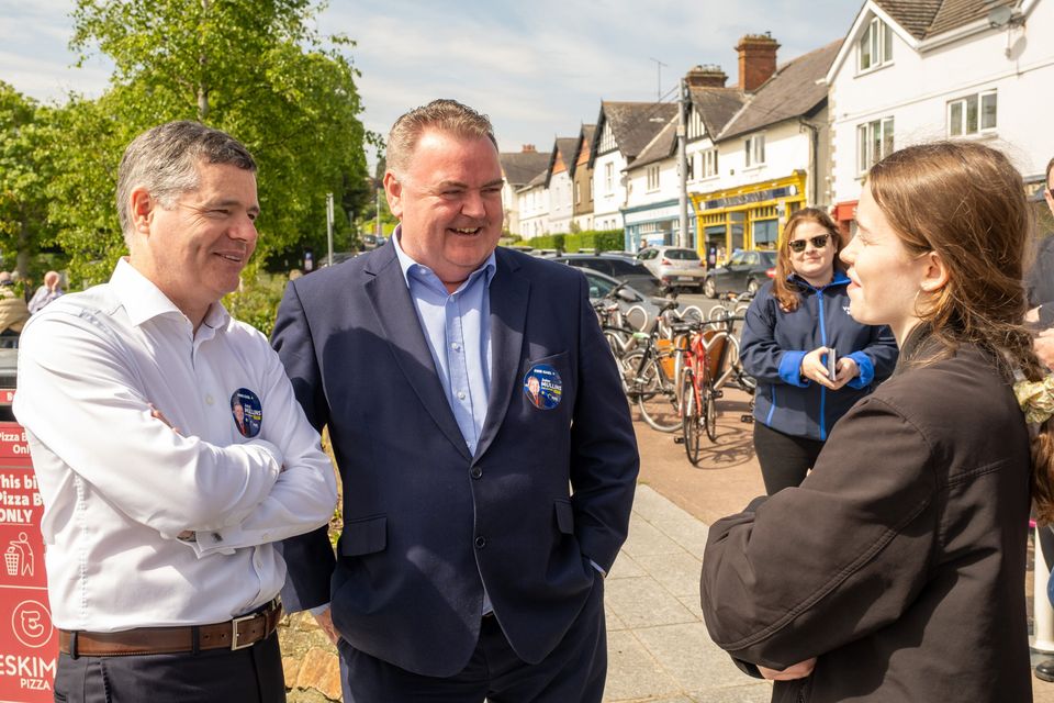 Minister Paschal Donohoe with Fine Gael European Election candidate for Ireland South John Mullins chatting with local Martha Dwyer, outside Burnaby Park, Greystones. 