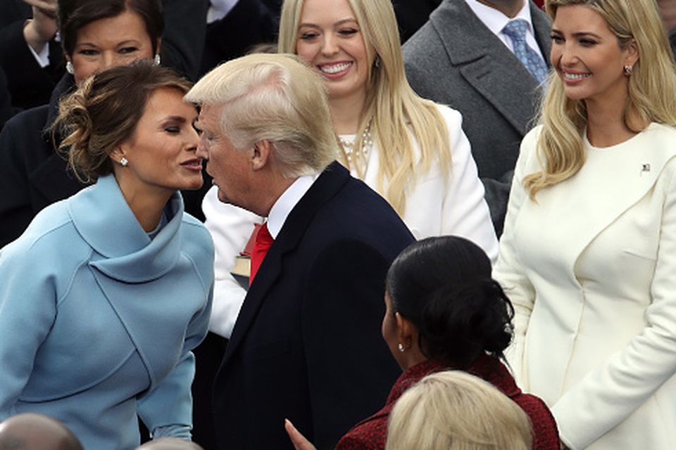 U.S. President-elect Donald Trump (2L) is greeted by (L-R) wife Melania Trump, and daughters Tiffany Trump and Ivanka Trump on the West Front of the U.S. Capitol on January 20, 2017 in Washington, DC. In today's inauguration ceremony Donald J. Trump becomes the 45th president of the United States. (Photo by Drew Angerer/Getty Images)