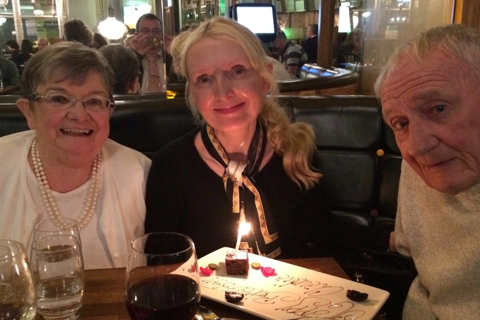 Family time: Claudia enjoying quality time with her parents Anne and Claude Carroll.