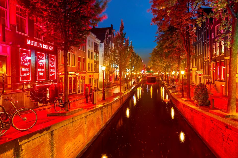 In the Netherlands, where prostitution is legal and regulated, there are about three-hundred cabins rented by prostitutes in Amsterdam's red-light district Photo: Sergey Borisov