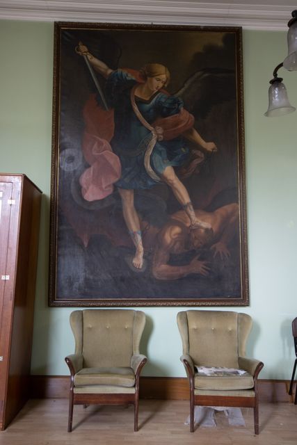 A striking painting in the larger of two reception rooms in which the Adoration Sisters would welcome family and guests.