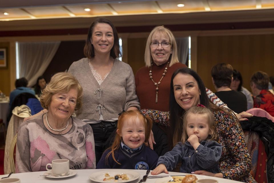 Emilie Leahy with her sister Abbie, mom Simone (from the right), grandmothers Anne Leahy (from the left) and Bernardine McGough (from the right standing) and Aisling Cronin enjoying the Killarney Soroptimist Charity Pancake morning in the Killarney Avenue Hotel on Tuesday.