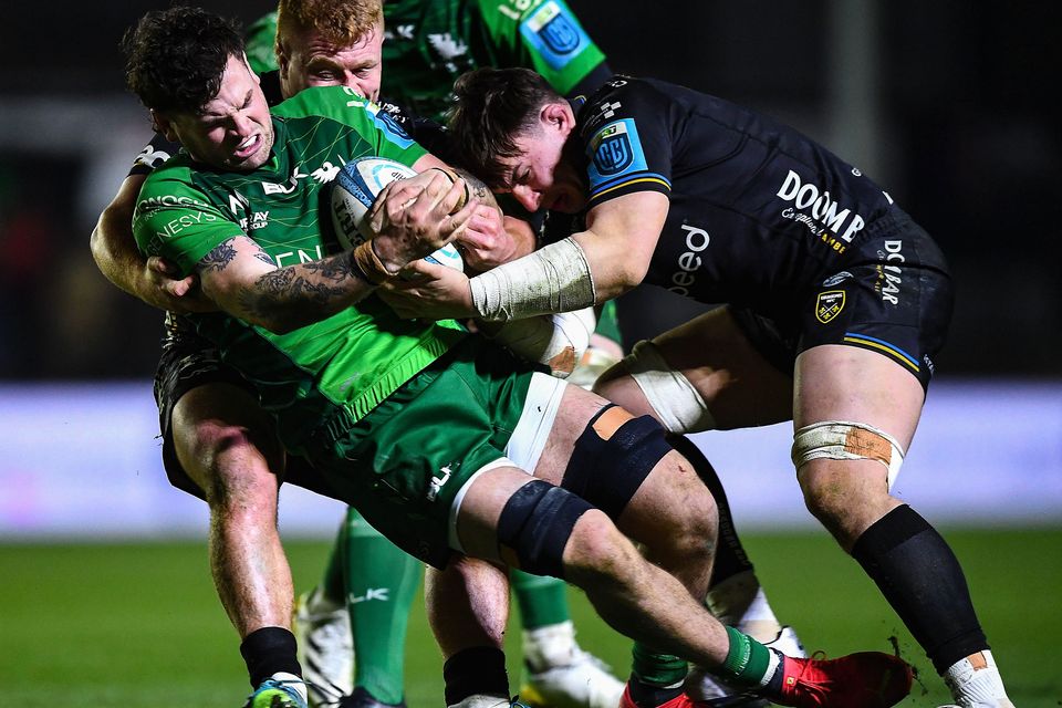 Conor Oliver of Connacht is tackled by Taine Basham, right, and Bradley Roberts of Dragons during last season's United Rugby Championship match at Rodney Parade in Newport, Wales. Photo by Ben Evans/Sportsfile