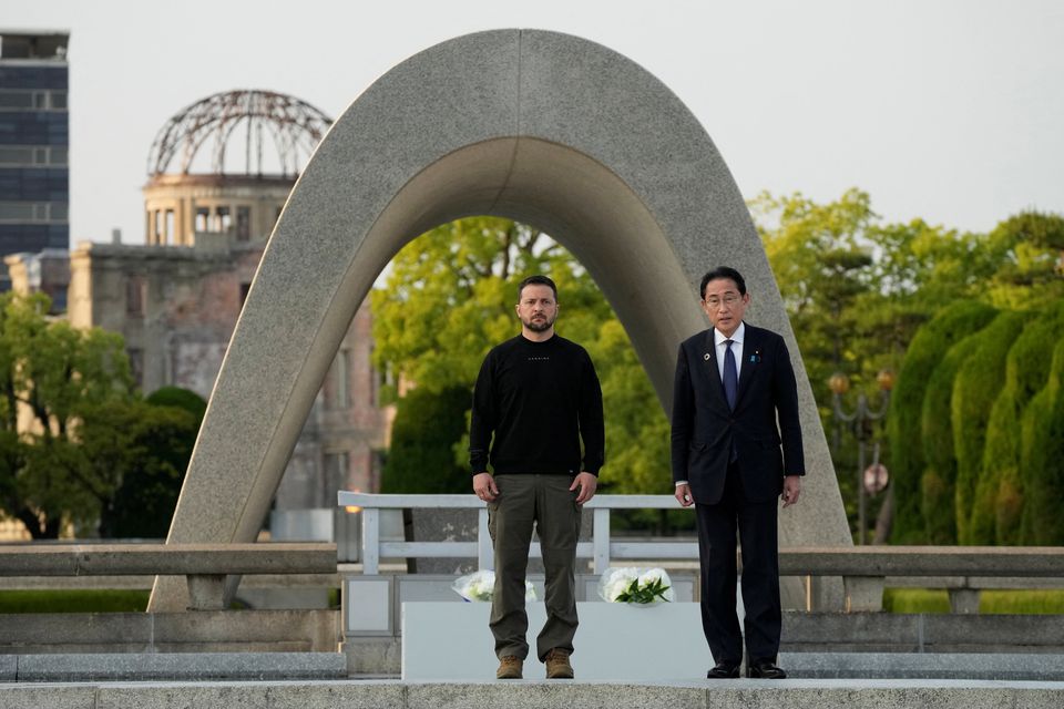 Ukrainian President Volodymyr Zelenskiy and Japanese Prime Minister Fumio Kishida visit the memorial to victims of the Hiroshima nuclear bomb during the G7 summit in the city. Photo: Eugene Hoshiko/Reuters