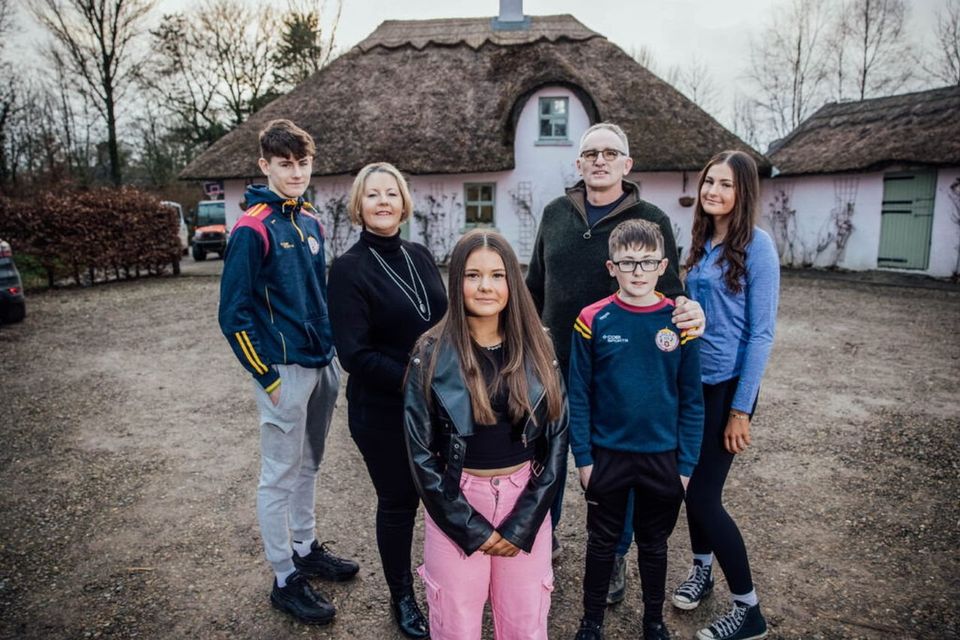Dublin teen Alex (centre) spent five days with the Hayes family at their dairy farm in Clare. Photo: RTÉ