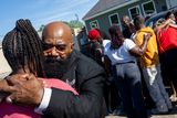 thumbnail: Family embrace after the horrendous act of violence in Shreveport, Louisiana. Photo: Getty