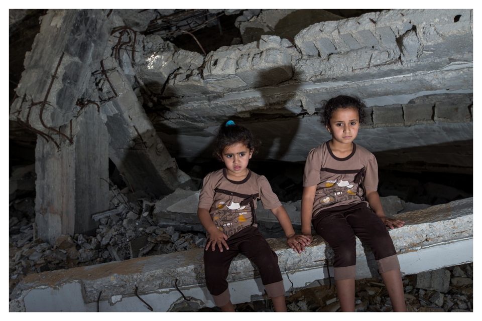 Hind (5) and Tahani Awedat (3) who were orphaned during the Gaza war in 2012 and saw their home destroyed by Israeli tanks during the 50-day war in 2014.  Photo: Mark Condren