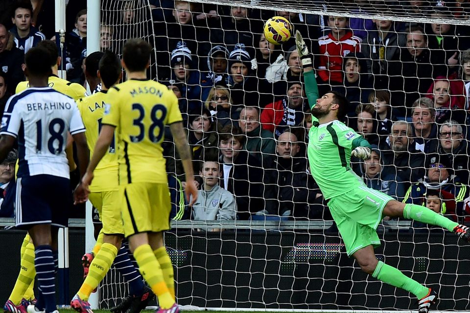 Tottenham's Christian Eriksen scores a free kick past West Brom's Ben Foster for the opening goal of the match