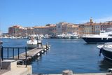 thumbnail: Blues: St Tropez was once a small fishing village, but although it has grown, it still retains its small village charm with petanque-playing locals and the ultra-wealthy yachts.
