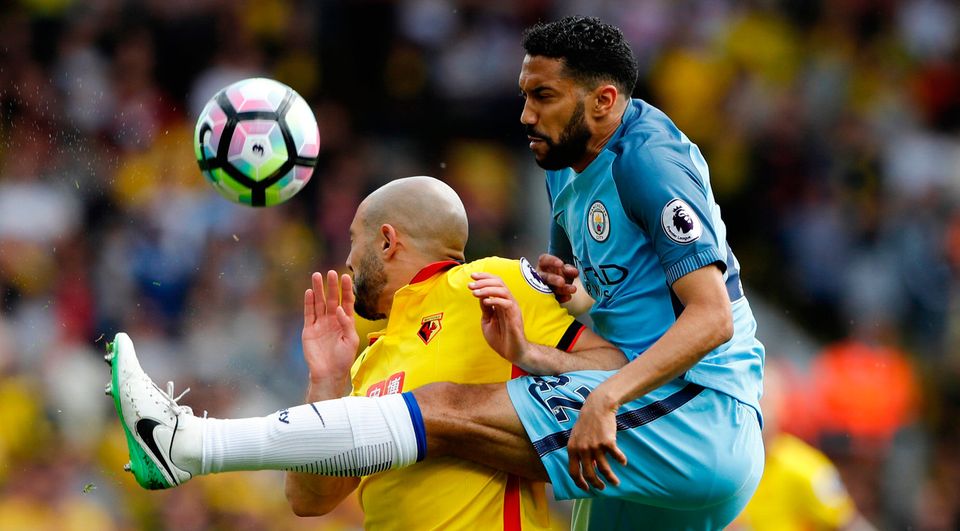 Manchester City's Gael Clichy in action with Watford's Nordin Amrabat. Photo: Reuters / Stefan Wermuth