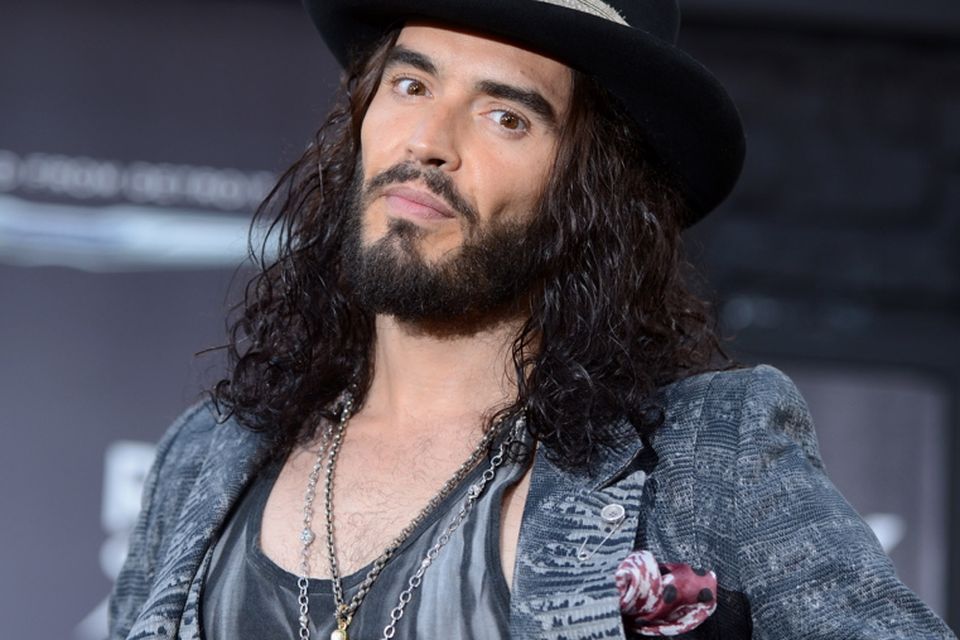 HOLLYWOOD, CA - JUNE 08: Actor Russell Brand arrives at the premiere of Warner Bros. Pictures' 'Rock of Ages' at Grauman's Chinese Theatre on June 8, 2012 in Hollywood, California. (Photo by Kevin Winter/Getty Images)  Date created:  08 Jun 2012