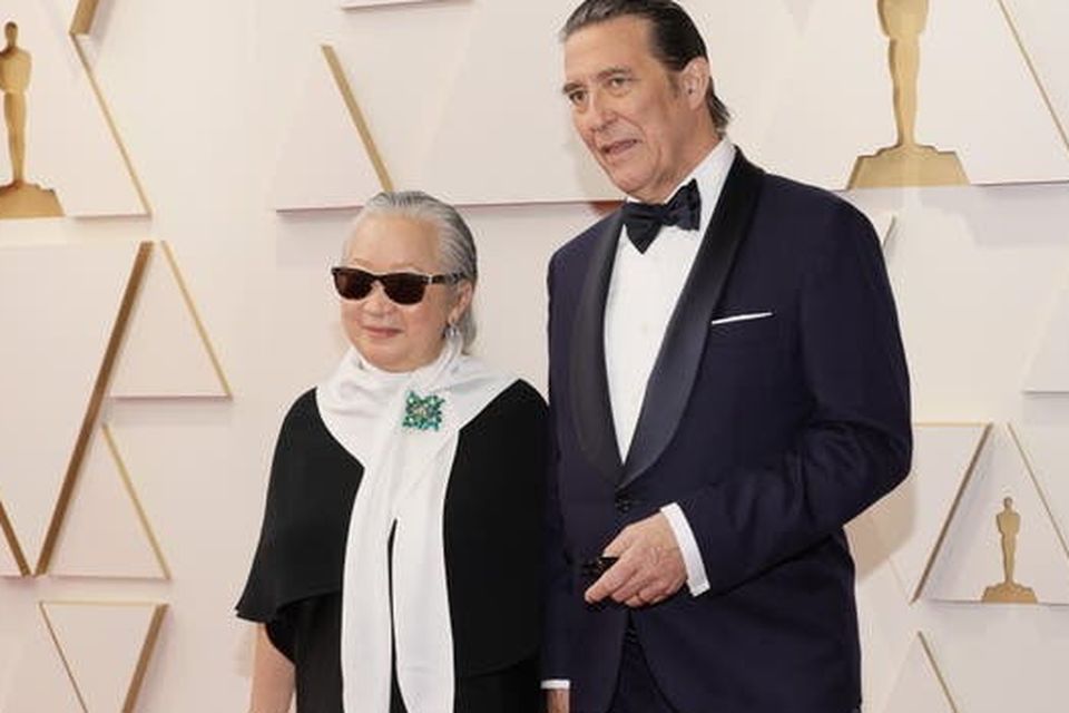 Hinds with wife Helene Patarot at the 2022 Academy Awards, where he was nominated for an Oscar for his role in 'Belfast'. Photo: Getty Images