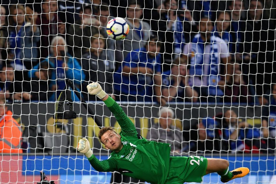 Simon Mignolet of Liverpool saves Jamie Vardy of Leicester City (not pictured) penalty during the Premier League match between Leicester City and Liverpool at The King Power Stadium on September 23, 2017 in Leicester, England.  (Photo by Laurence Griffiths/Getty Images)