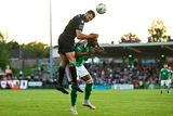 thumbnail: Tunde Owolabi of Cork City is tackled by Roberto Lopes of Shamrock Rovers during the game. Photo: Eóin Noonan/Sportsfile