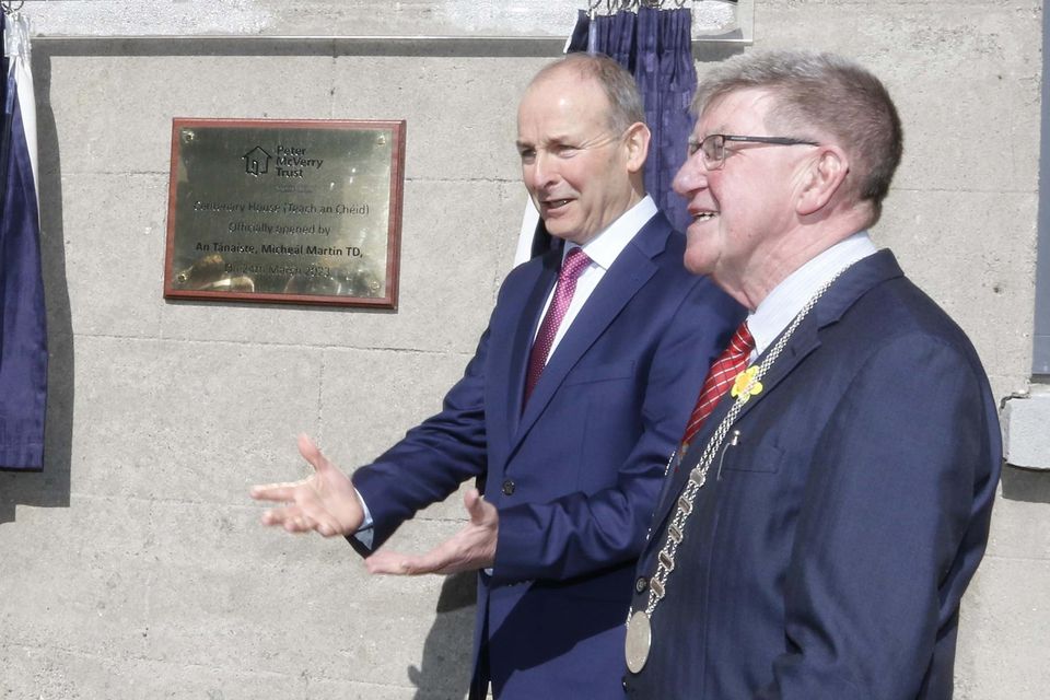 Tánaiste Micheál Martin T.D. unveiling the plaque renaming the old CBS in Charleville as Centenary House, which houses the new social housing facility in the town.