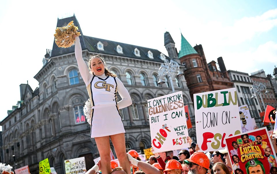 24 August 2024; Georgia Tech cheerleader Sam Noe during the ESPN College GameDay pre-match event in Dublin ahead of the 2024 Aer Lingus College Football Classic match between Florida State and Georgia Tech at the Aviva Stadium. Photo by David Fitzgerald/Sportsfile 