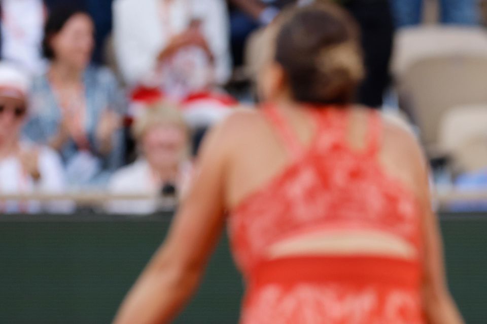 Sabalenka waits at the net to congratulate the teenager (Jean-Francois Badias/AP)