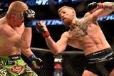 thumbnail: 18 January 2015; Conor McGregor, right, in action against Dennis Siver. UFC Fight Night, Conor McGregor v Dennis Siver, TD Garden, Boston, Massachusetts, USA. Picture credit: Ramsey Cardy / SPORTSFILE