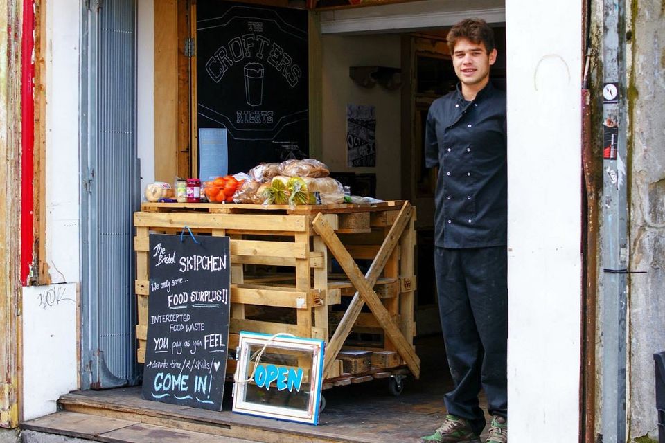 Sam Joseph, co-director of Skipchen, outside the new cafe that serves meals made from food rescued from the bin it has opened in Bristol (The Real Junk Food Project of Bristol Skipchen/PA)
