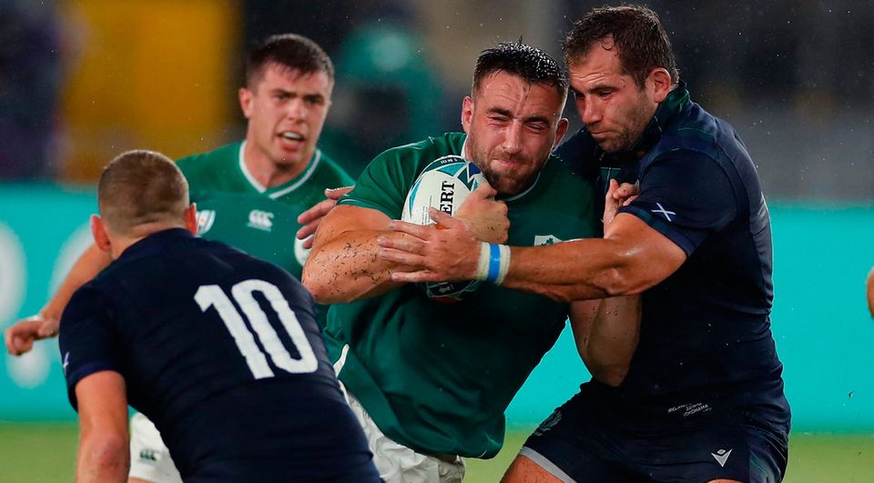 Ireland's back row Jack Conan (2nd R) is tackled. Photo: Getty Images